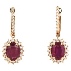 Earrings set with ruby and diamonds 18k pink gold