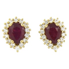Ohrringe aus 18 Karat Gelbgold mit Rubin und Diamanten besetzt