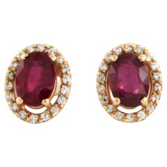 Boucles d'oreilles serties de rubis jusqu'à 2,02ct et de diamants taille brillant  Or rose 14k