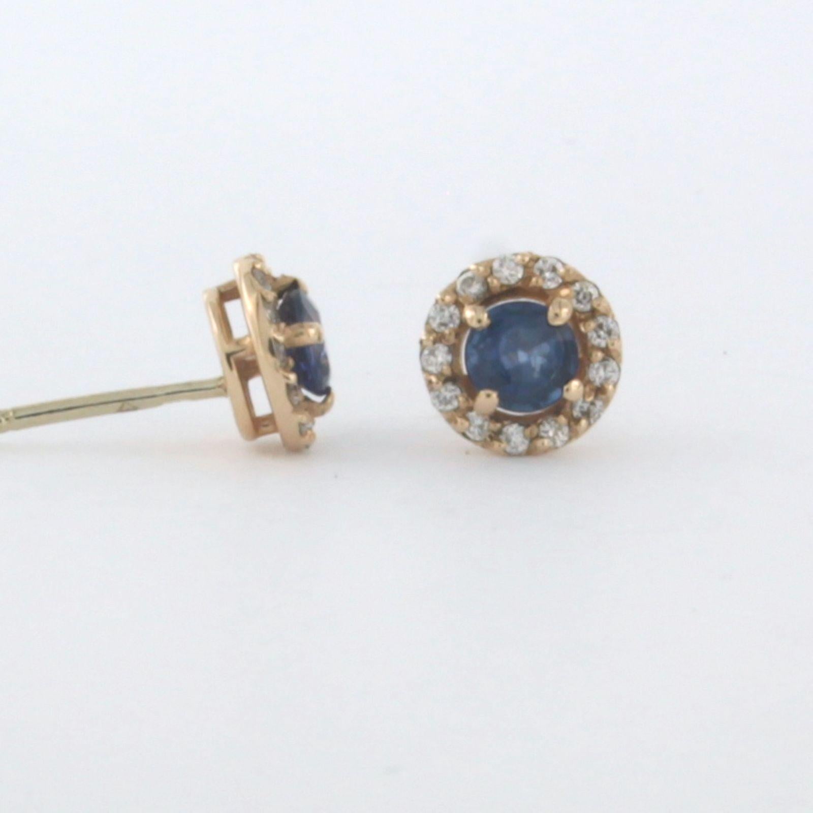 14k rose gold entourage stud earrings set with sapphire up to. 0.56 ct and brilliant cut diamonds up to. 0.14ct - G/H - VS/SI

detailed description:

the top of the ear stud has a diameter of 7.0 mm wide

weight 1.6 grams

set with

- 2 x 4.0 mm
