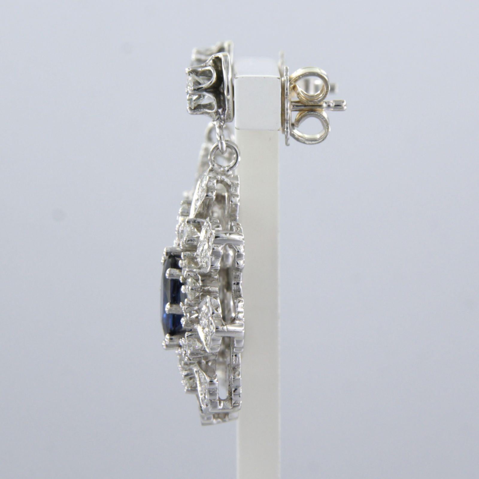 Brilliant Cut Earrings set with sapphire and diamonds 18k white gold
