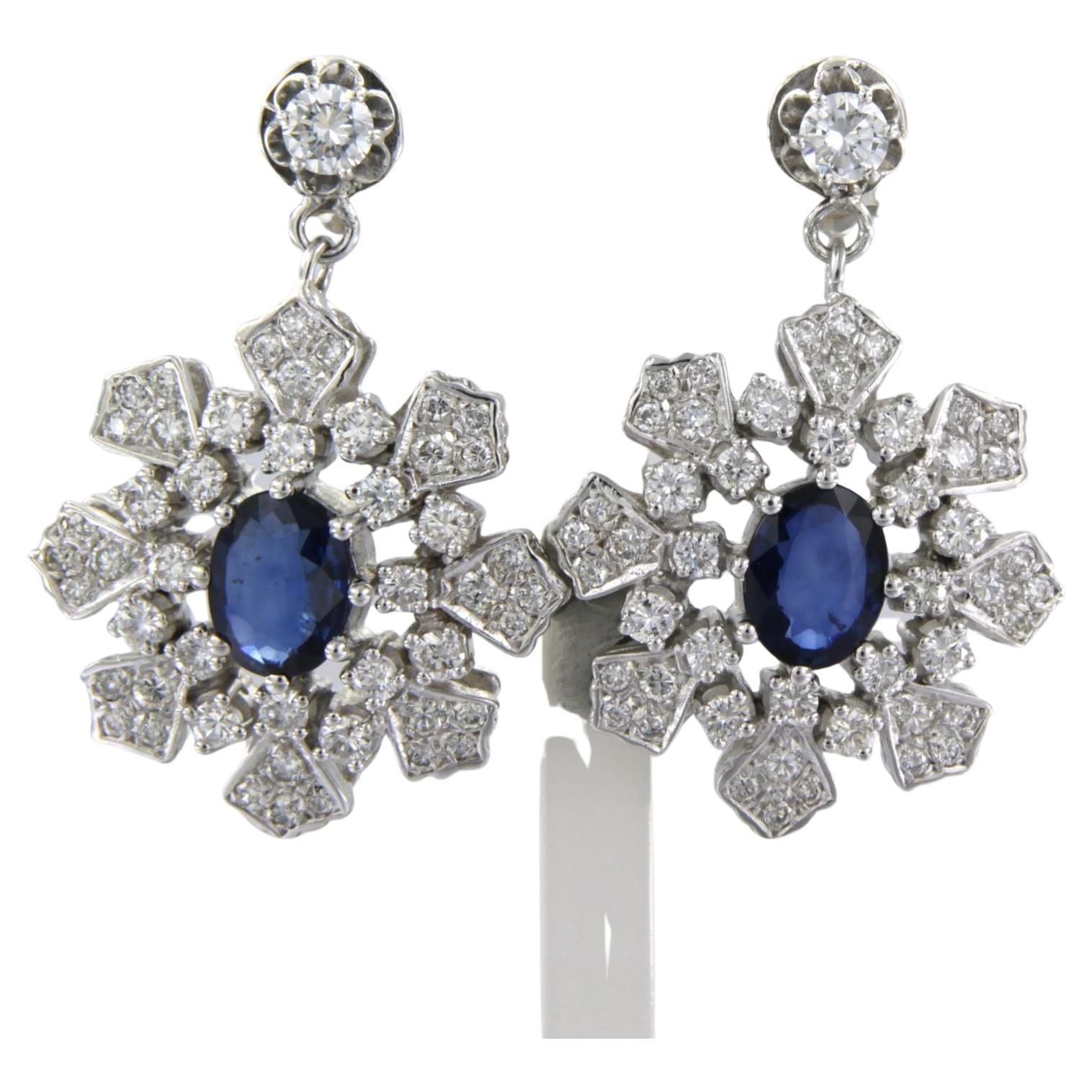 Earrings set with sapphire and diamonds 18k white gold