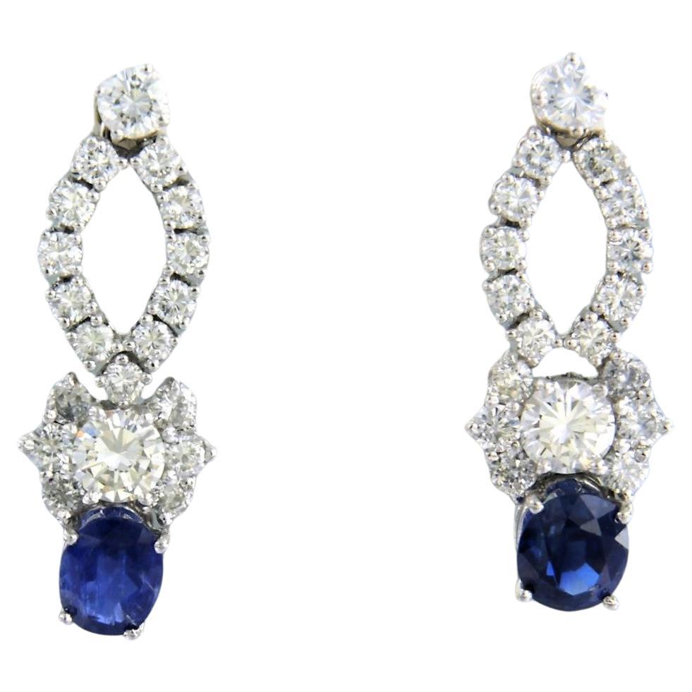 Earrings set with Sapphire and diamonds 18k white gold For Sale