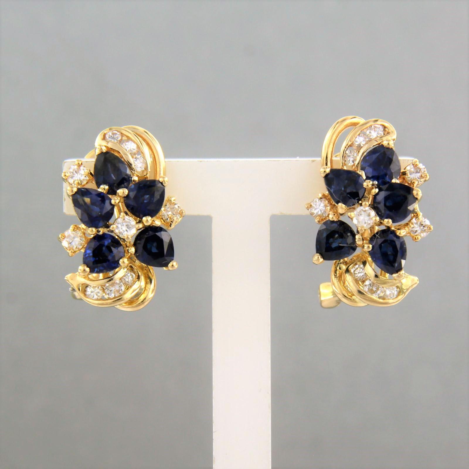 18k gold clip-on earrings set with 1.50ct sapphire and brilliant cut diamonds up to. 0.40ct - F/G - VS/SI

detailed description:

the front of the ear clip is 1.5 cm long by 1.1 cm wide

weight 6.3 grams

set with

- 10 x 3.8 mm x 3.0 mm drop shape