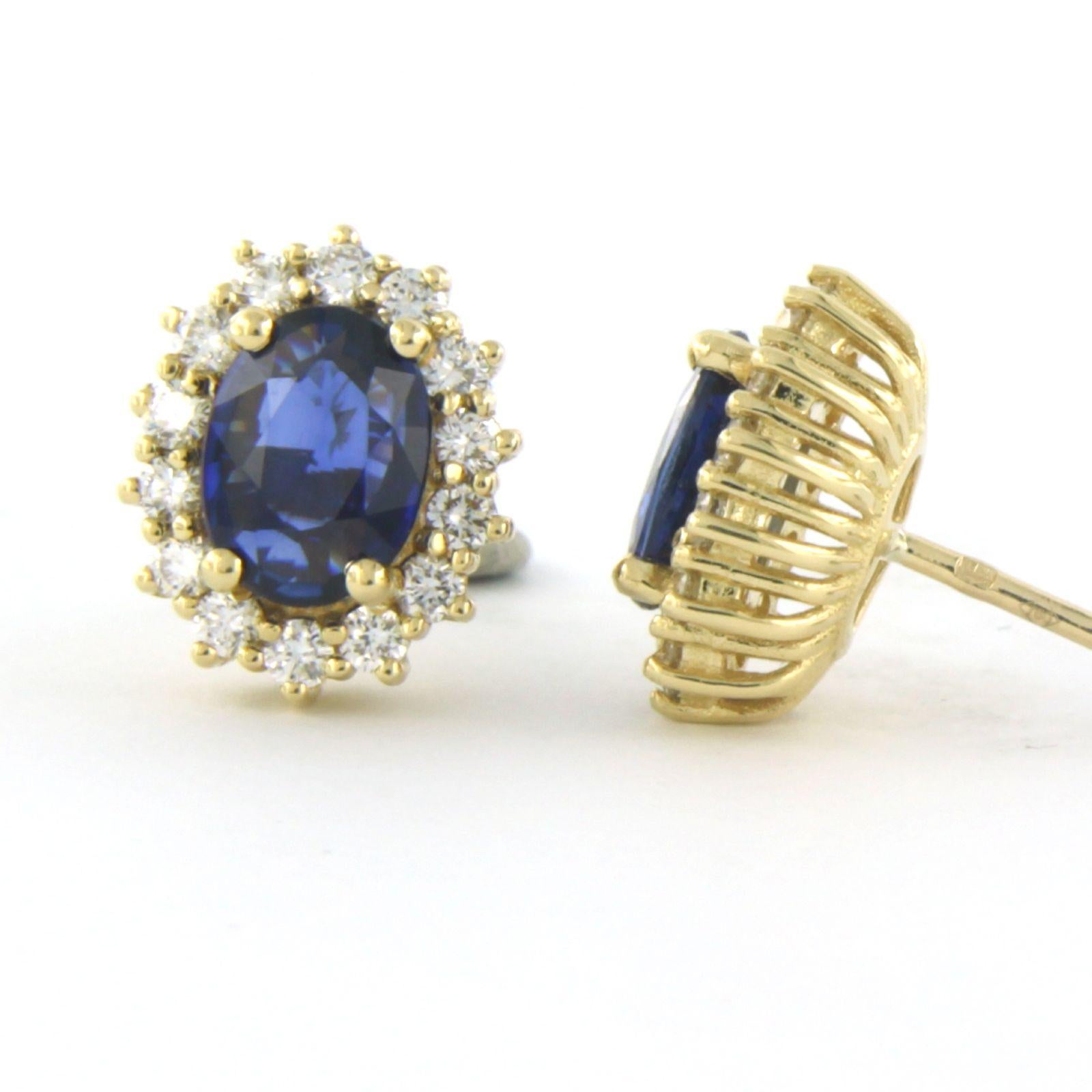 Modern Earrings set with sapphire and diamonds 18k yellow gold For Sale