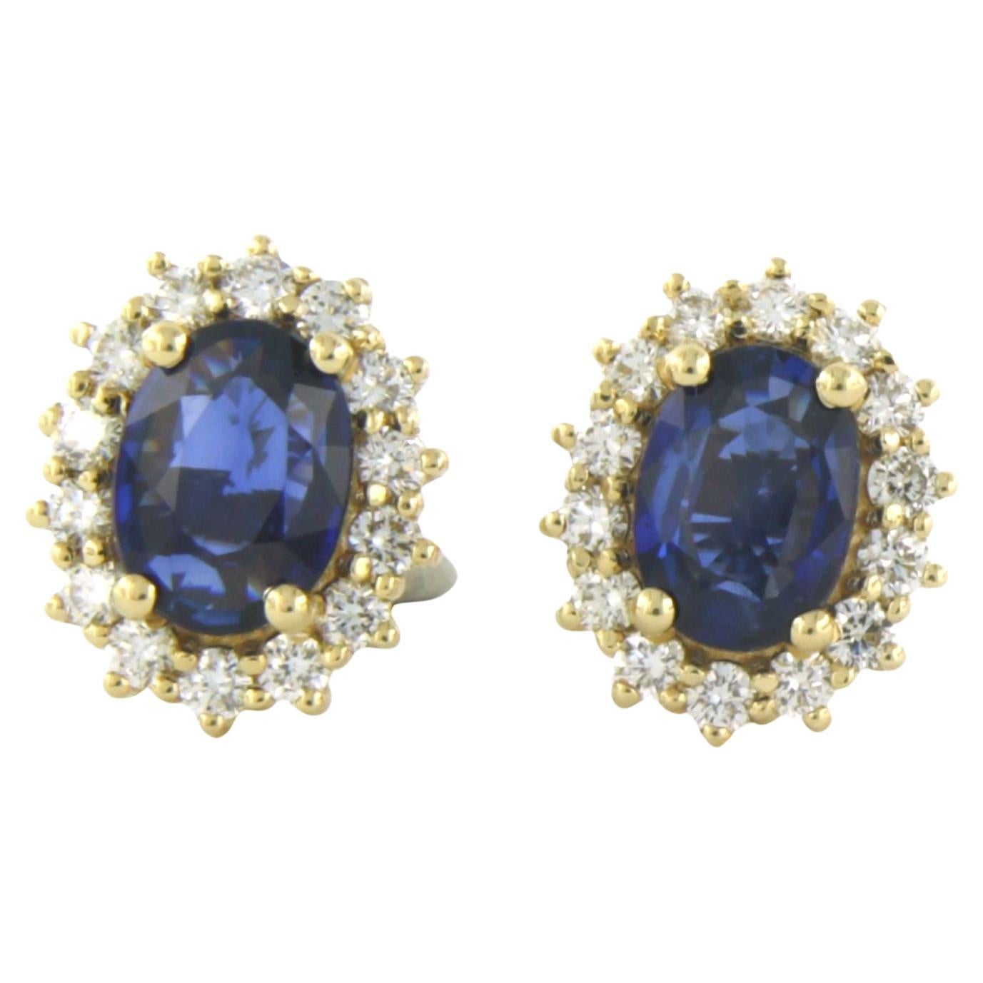 Earrings set with sapphire and diamonds 18k yellow gold