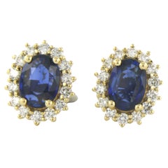 Boucles d'oreilles en or jaune 18k serties de saphirs et de diamants