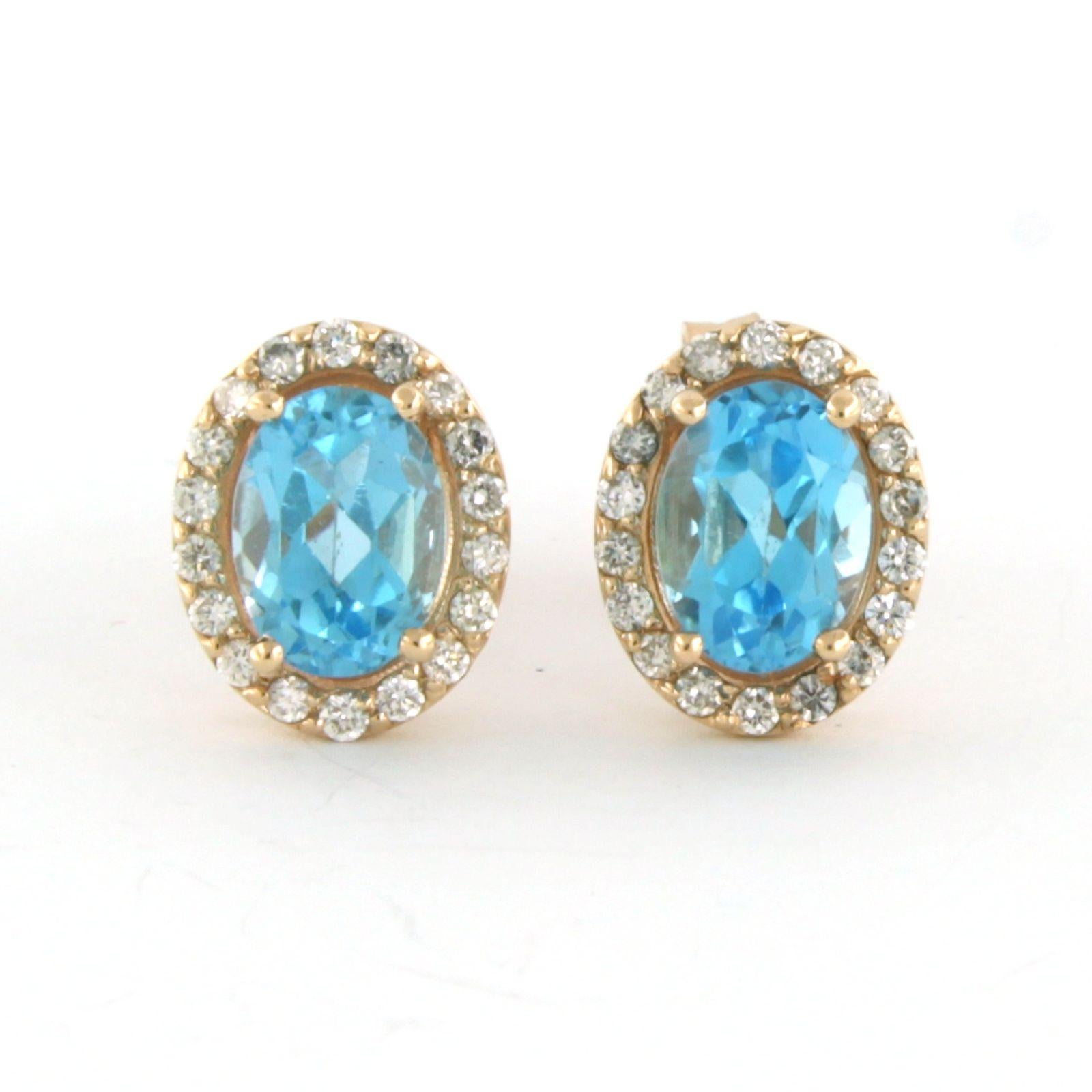 Earrings set with topaz and brilliant cut diamonds up to 0.26ct 14k pink gold For Sale