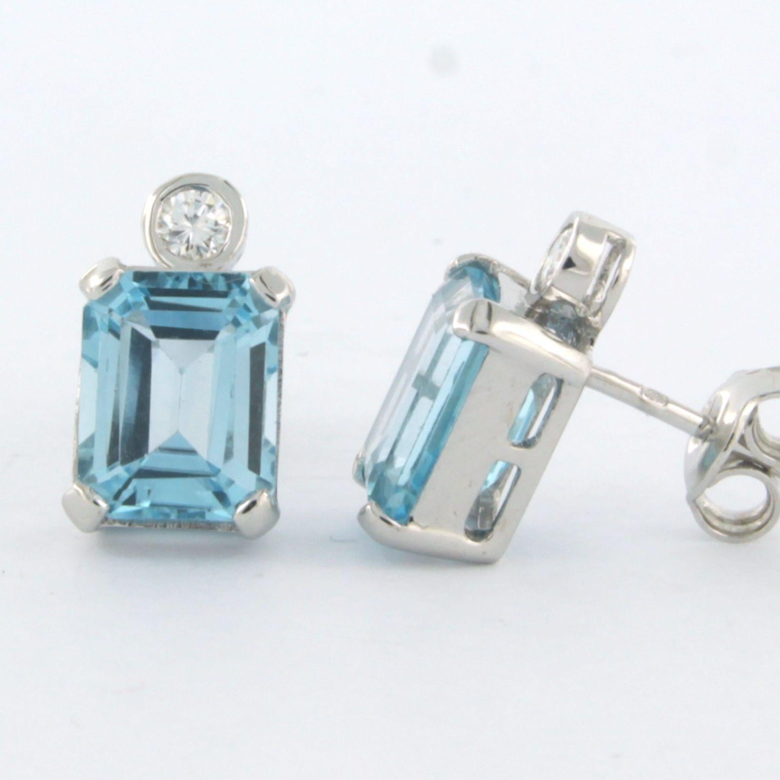 Modern Earrings set with topaz and diamonds 14k white gold