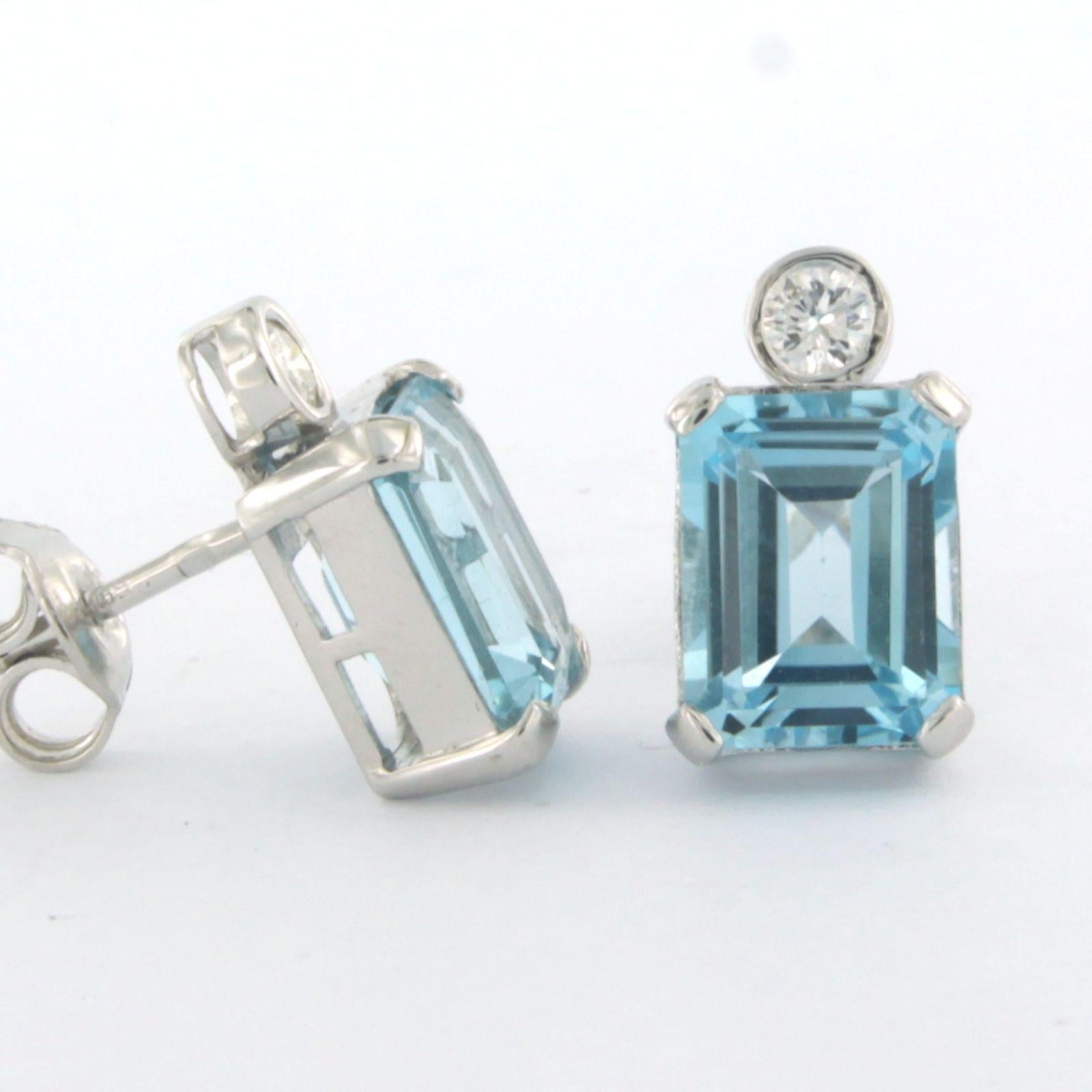 Brilliant Cut Earrings set with topaz and diamonds 14k white gold For Sale