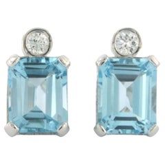 Boucles d'oreilles en or blanc 14 carats serties de topaze et de diamants