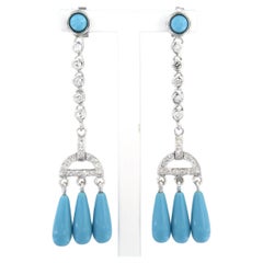 Earrings set with turquoise and diamonds 14k white gold