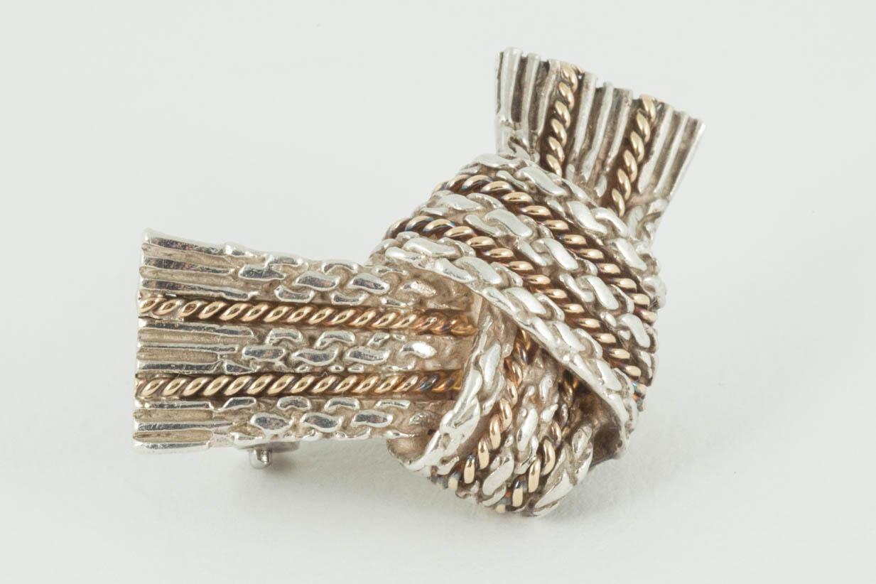 Art Deco Vintage Hermès of Paris Tied Ribbon Brooch in Silver & 18 Karat Gold, circa 1960 For Sale