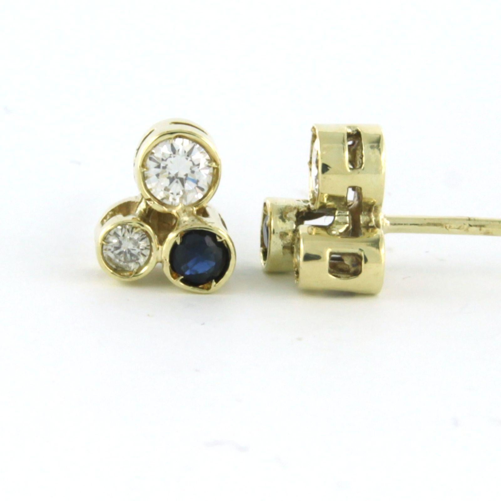 Modern Earrings stud set with sapphire and diamonds 14k yellow gold