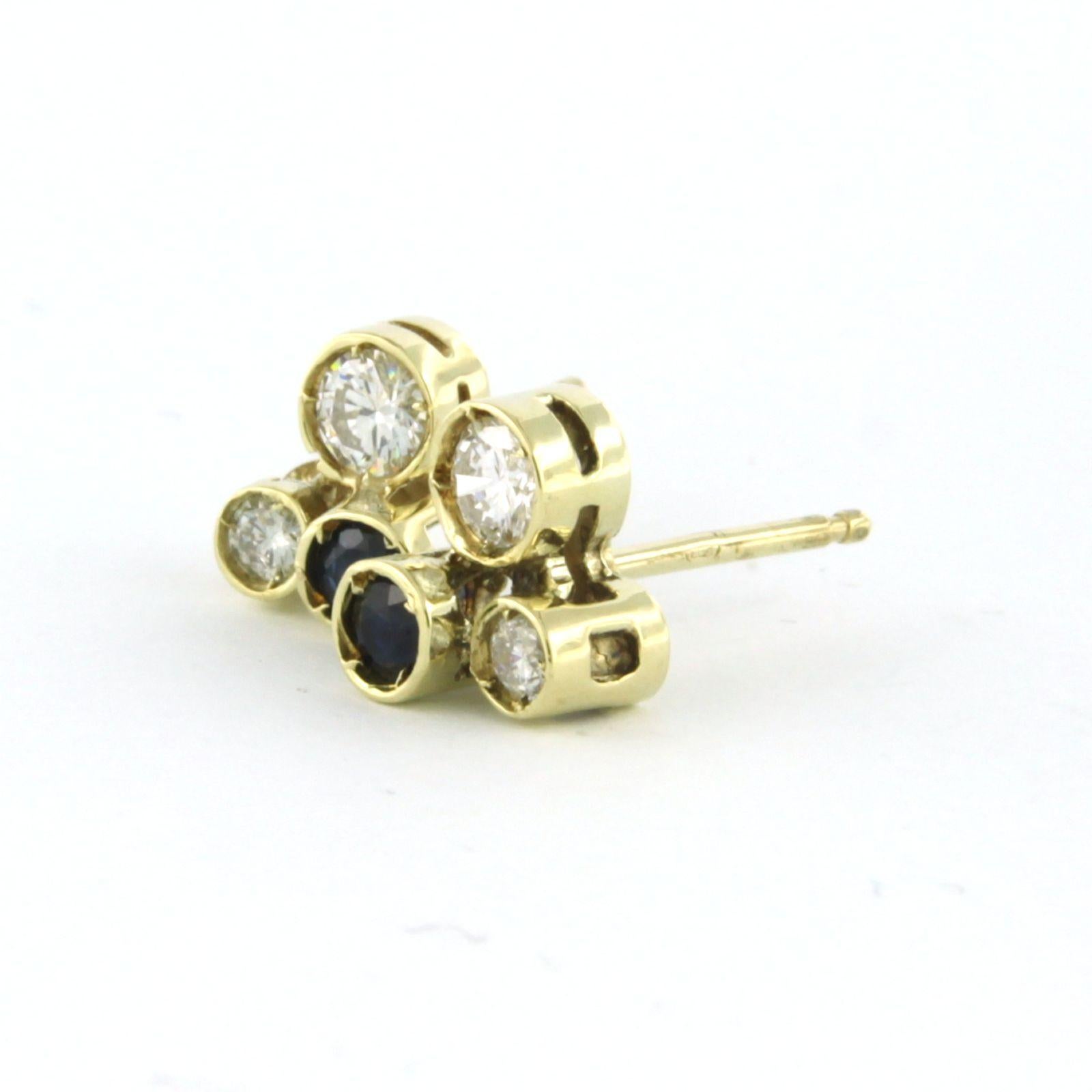 Women's Earrings stud set with sapphire and diamonds 14k yellow gold