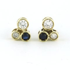 Ohrstecker aus 14 Karat Gelbgold mit Saphiren und Diamanten besetzt