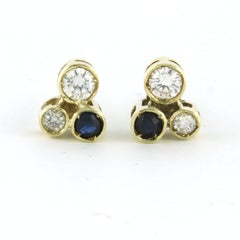 Earrings stud set with sapphire and diamonds 14k yellow gold