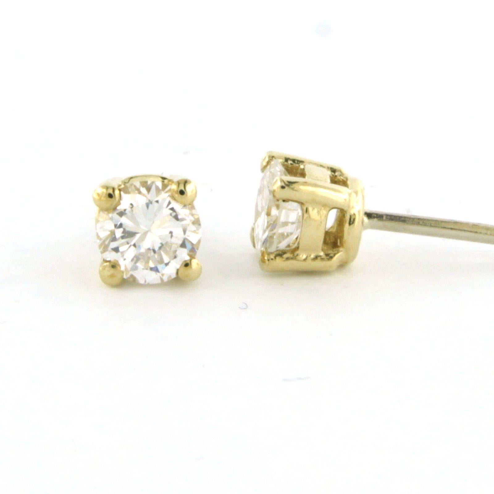 Modern Earrings studs set with diamonds 14k yellow gold