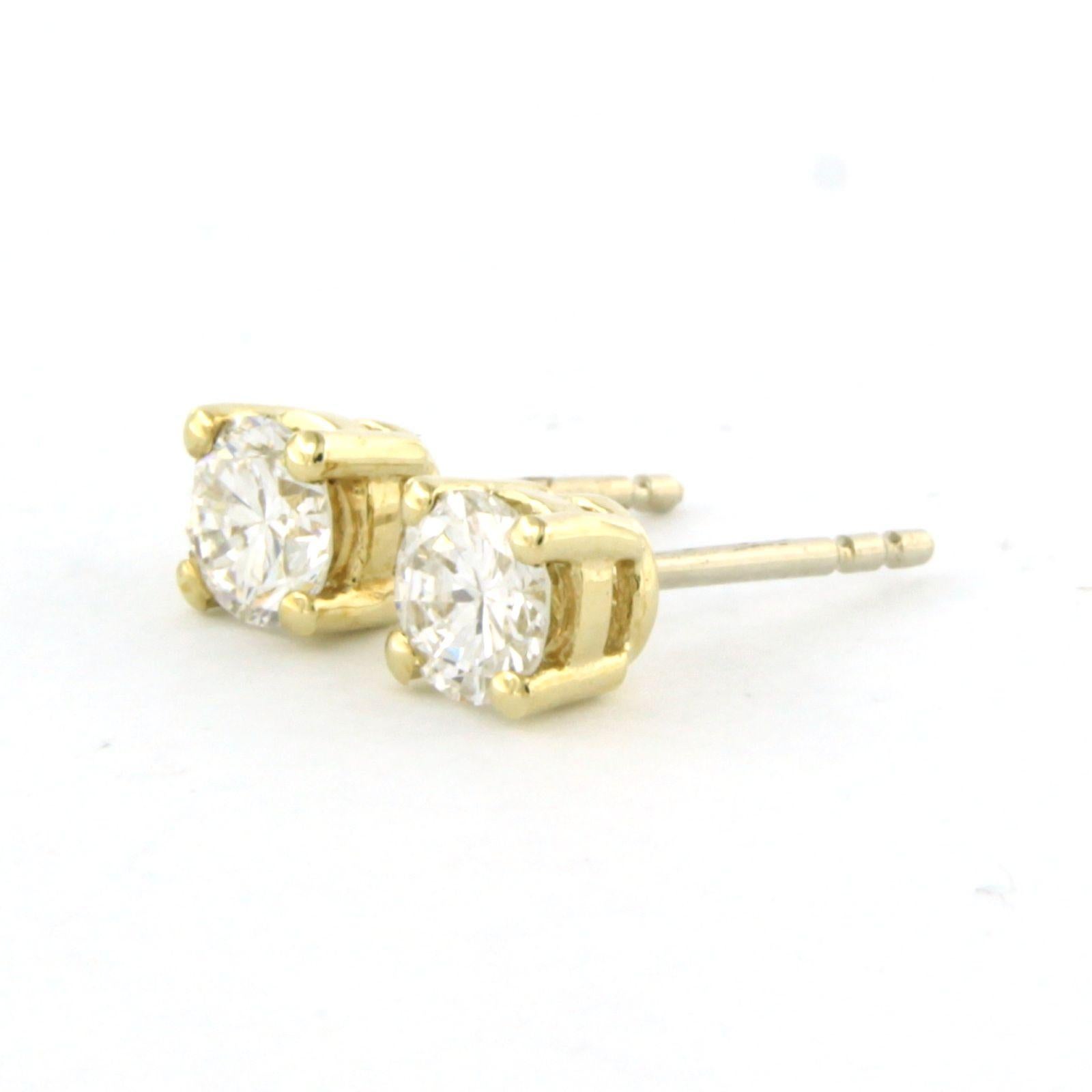 Women's Earrings studs set with diamonds 14k yellow gold