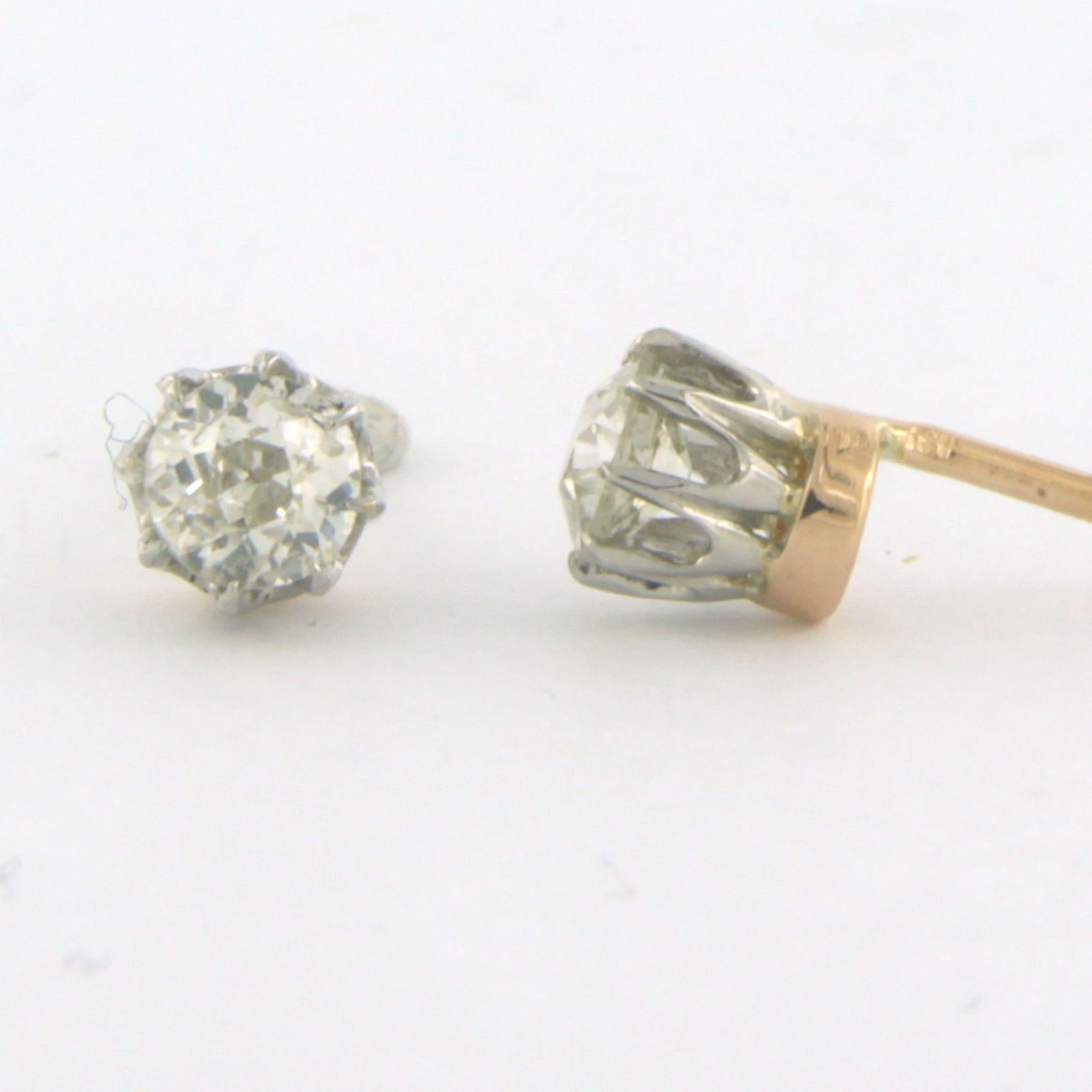 Modern Earrings studs set with diamonds 18k bicolour gold For Sale
