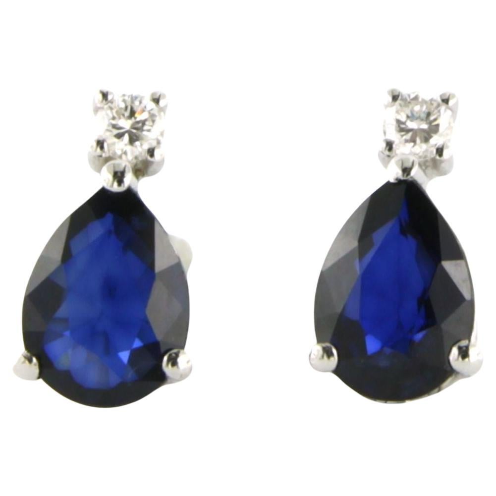 Earrings studs set with sapphire up to 1.40ct and diamonds up to 0.08ct 18k gold For Sale