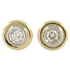 Earrings studs with brilliant cut diamonds up to 0.14ct 14k bicolour gold