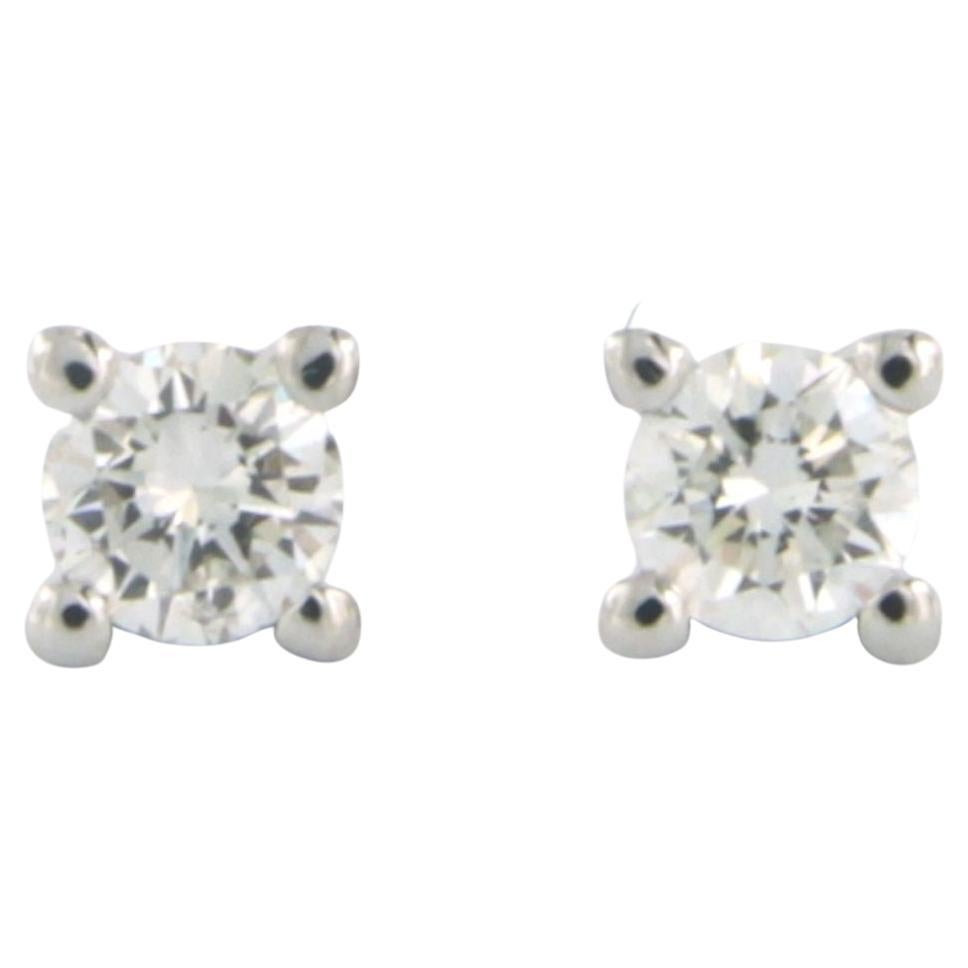 Earrings studs with brilliant cut diamonds up to 0.62ct 14k white gold