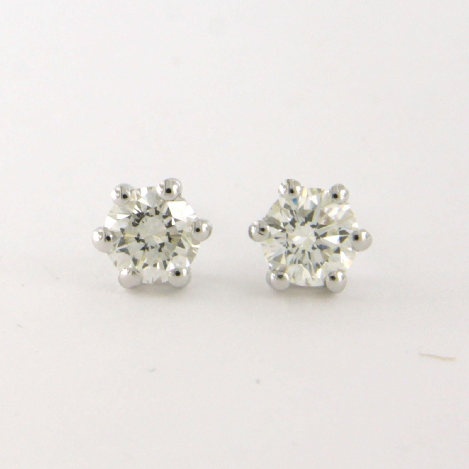 Modern Earrings studs with brilliant cut diamonds up to 0.72ct - 1.4 grams - 14k gold For Sale