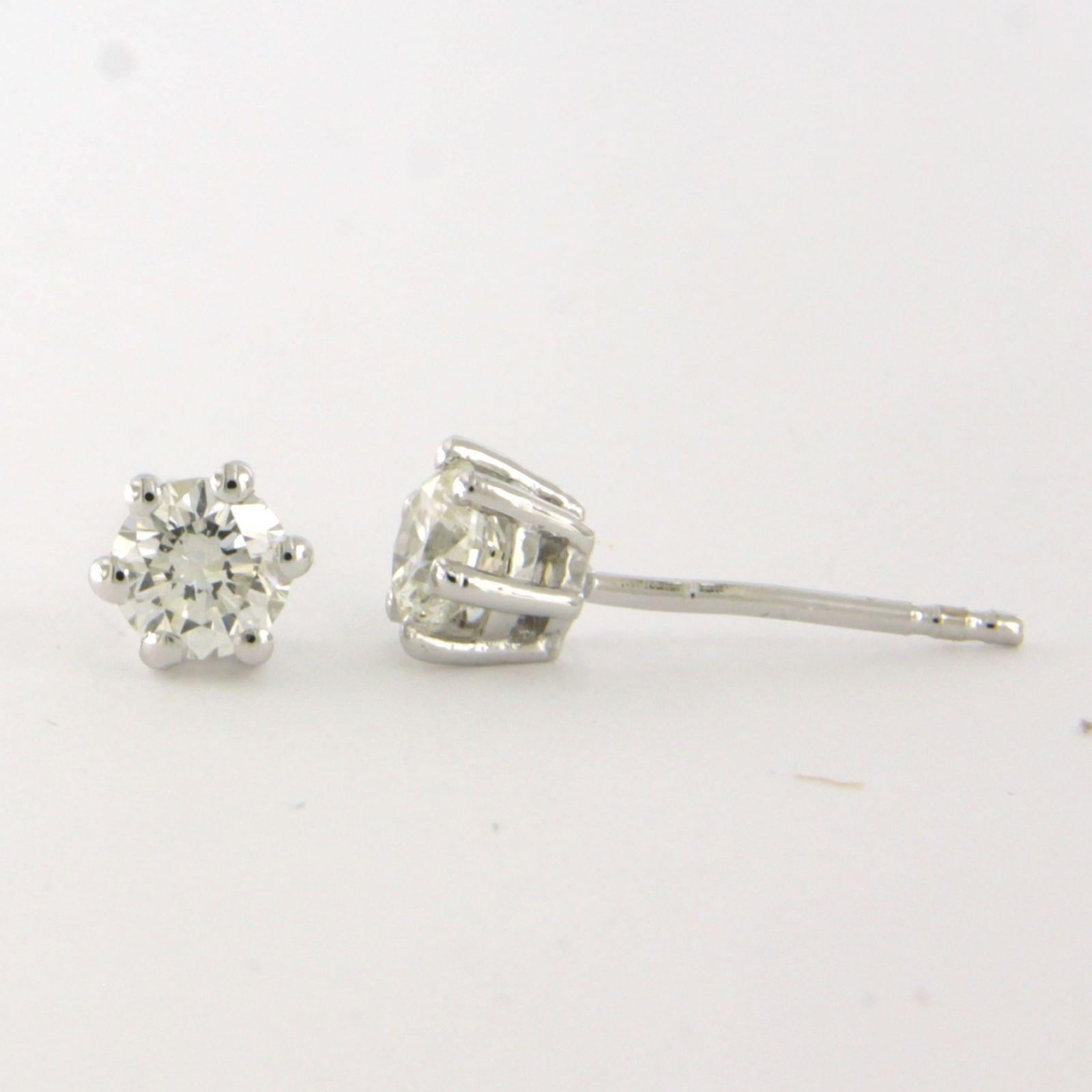 Earrings studs with brilliant cut diamonds up to 0.72ct - 1.4 grams - 14k gold In New Condition For Sale In The Hague, ZH
