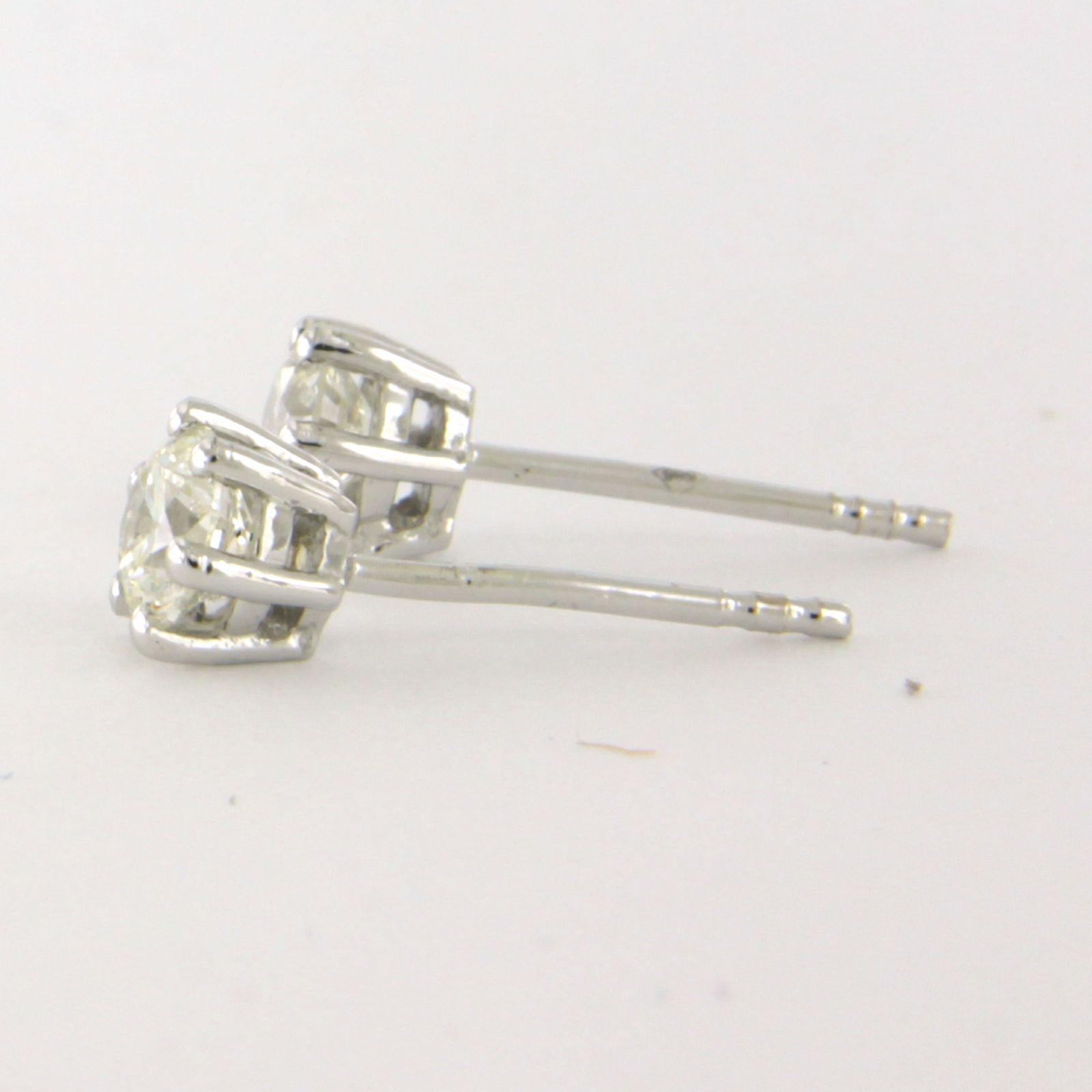 Women's Earrings studs with brilliant cut diamonds up to 0.72ct - 1.4 grams - 14k gold For Sale
