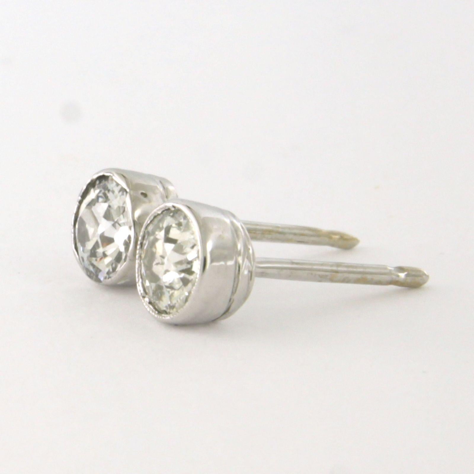 Earrings studs with old European cut diamonds up to 1.10ct b14k gold 1.8 grams In Excellent Condition For Sale In The Hague, ZH