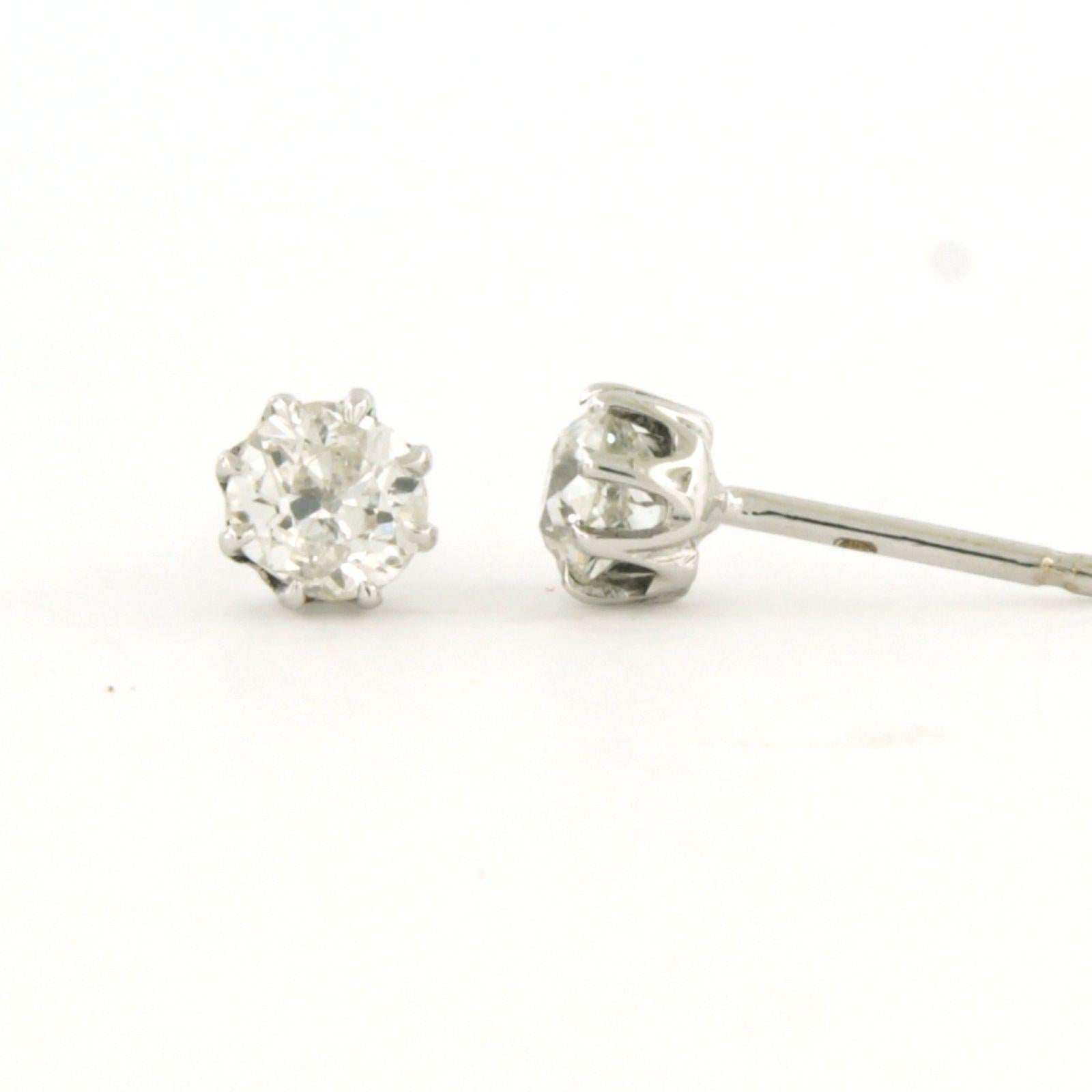 Early Victorian Earrings studs with old mine cut diamonds up to 1.00ct 14k white gold 1.3 grams For Sale