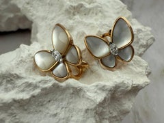 Boucles d'oreilles Van Cleef & Arpels Deux papillons en or rose diamants