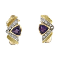 Boucles d'oreilles avec améthystes et diamants taille brillant jusqu'à 0,32 ct, en or 18 carats, 8,3 g