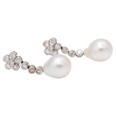Boucles d'oreilles avec perles australiennes et diamants