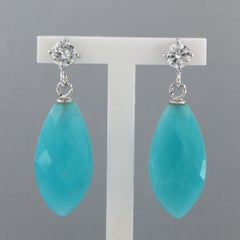 Earrings with blue chalcedony and brilliant cut diamonds up to 0.56ct 18k gold