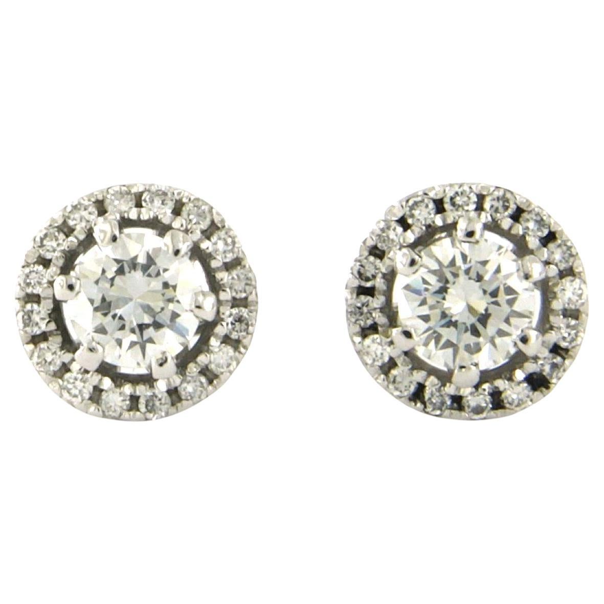 Earrings with brilliant cut diamonds up to 0.84ct 18k white gold