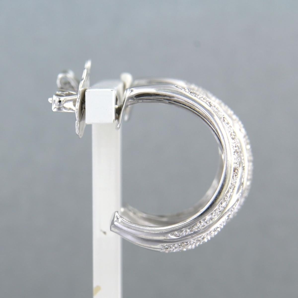 14k white gold stud earrings set with brilliant cut diamonds up to 1.60ct - G/H - SI

detailed description:

The size of the stud earrings is 2.2 cm long by 1.4 cm wide

Weight 14.1 grams

Set with

- 158 x 1.3 mm brilliant cut diamonds totaling
