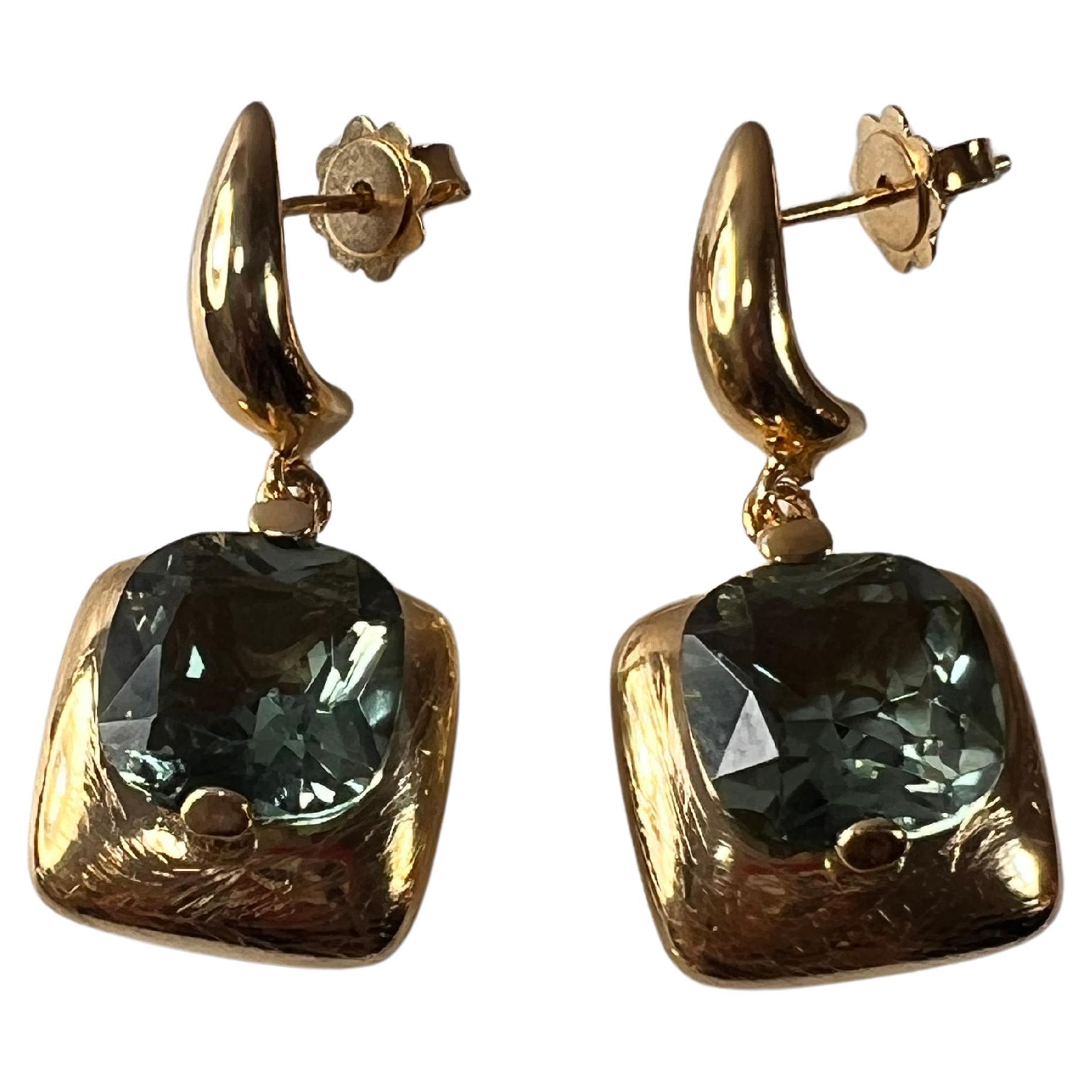 Eearrings with round brillant Quartz stone, in Silver 925/1000 e 24kt smooth and glossy Golden finish.  The quartz 12mm .  Earring Length 35mm or 1,37inches 
Option of 5 different colour quarts: Fumé, Cognac, Viola, Verde, Blu
N.B. If the chosen