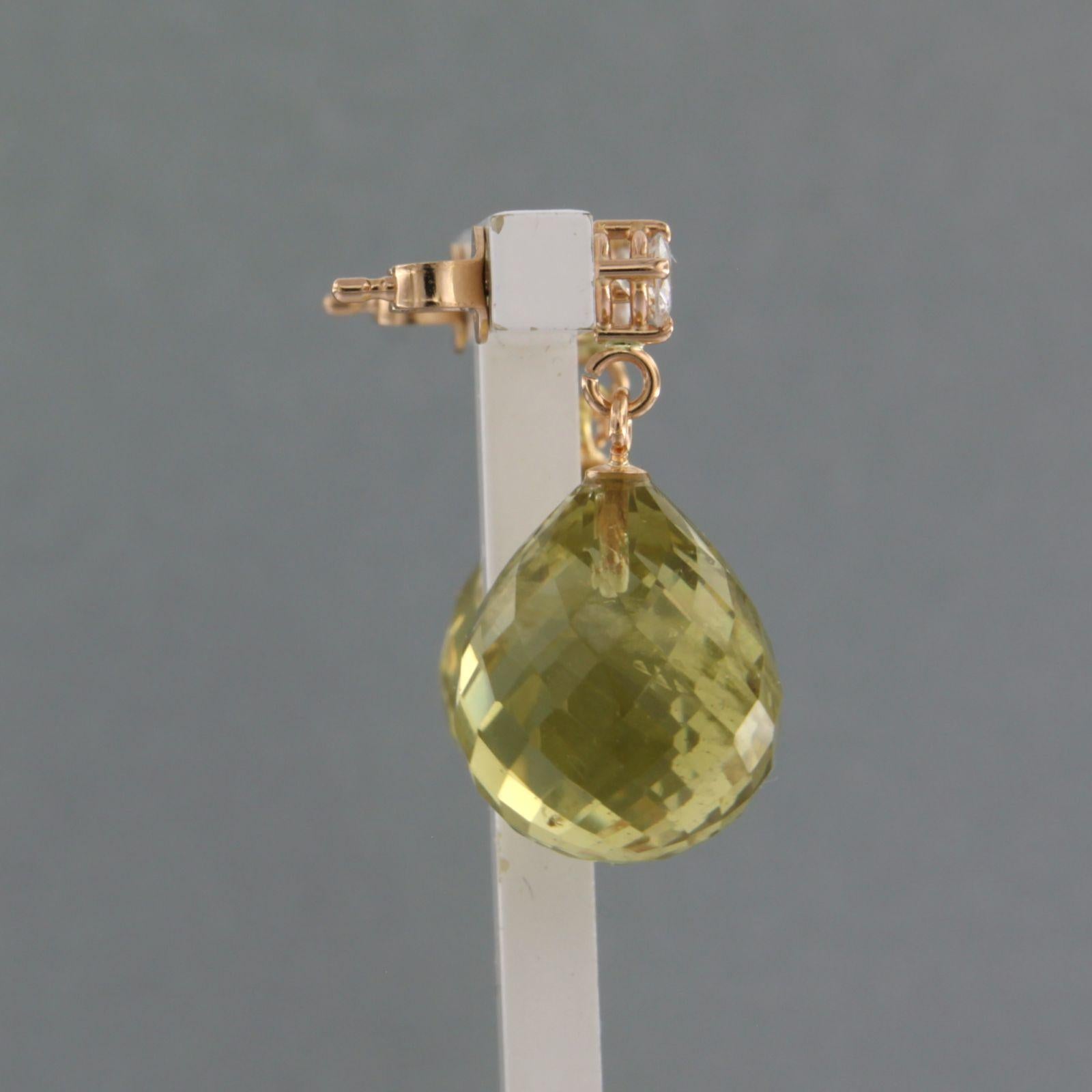 18k yellow gold earrings with citrine and brilliant cut diamond up to 0.40ct - F/G - SI

Detailed description:

the size of the earring is 2.4 cm long by 1.3 cm wide

Total weight 8.2 grams

set with

- 2 x 1.5 cm x 1.3 cm drop shape facet cut