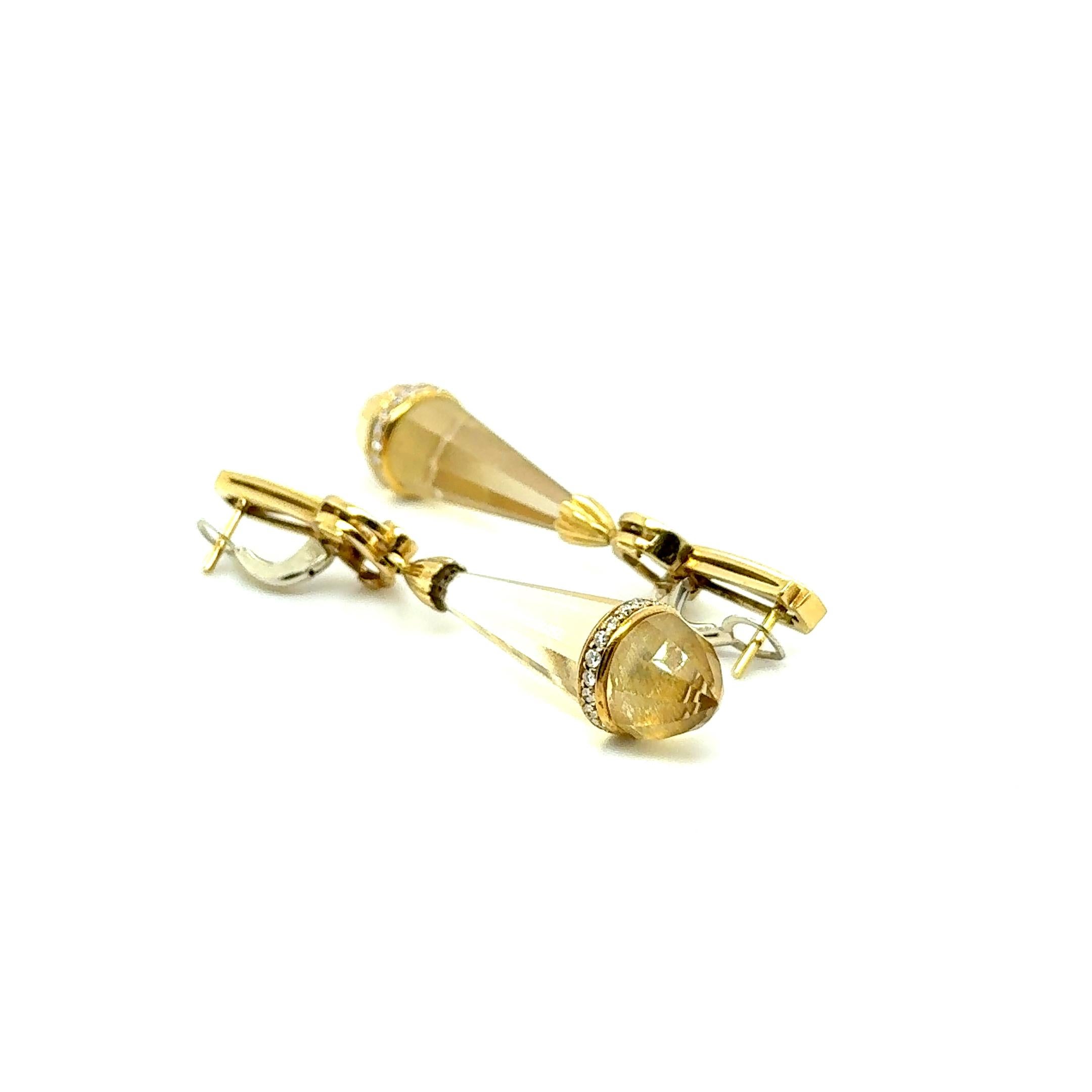 These exquisite earrings, crafted by the renowned Swiss house of Gübelin, radiate the timeless allure of a vintage masterpiece. 

Fashioned from 18-karat yellow gold, they feature four fantasy-cut citrines complemented by 74 brilliant-cut diamonds,