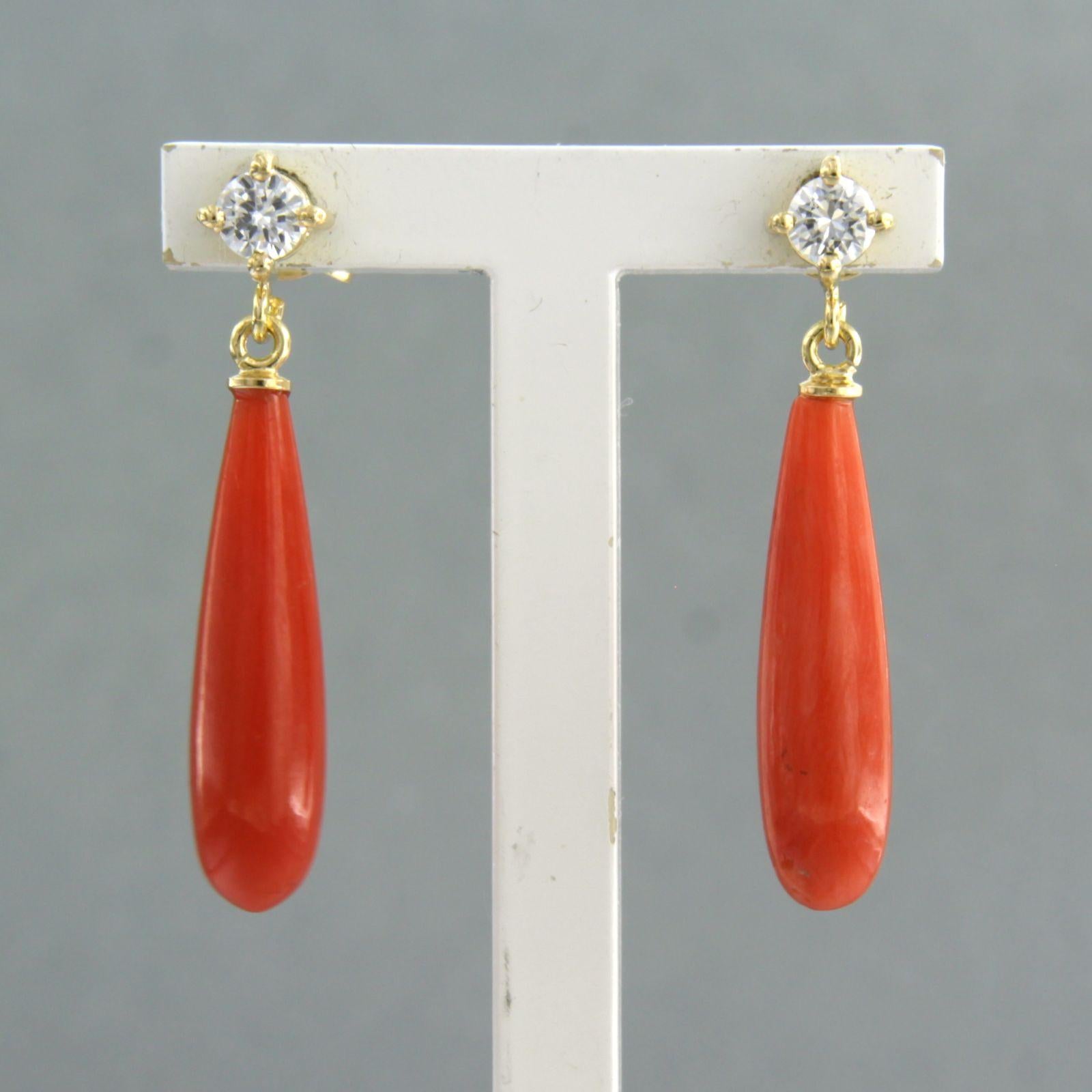 18k yellow gold earrings set with Corallium Rubrum and brilliant cut diamonds up to 0.28ct – H/I – VS/SI

Detailed description:

The size of the earring is 2.9 cm long by 5.2 mm wide

Total weight 3.3 grams

set with

- 2 x 2.0 cm x 5.2 mm icicle