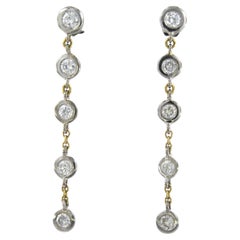 Earrings with diamonds in total 1.40ct 18k gold