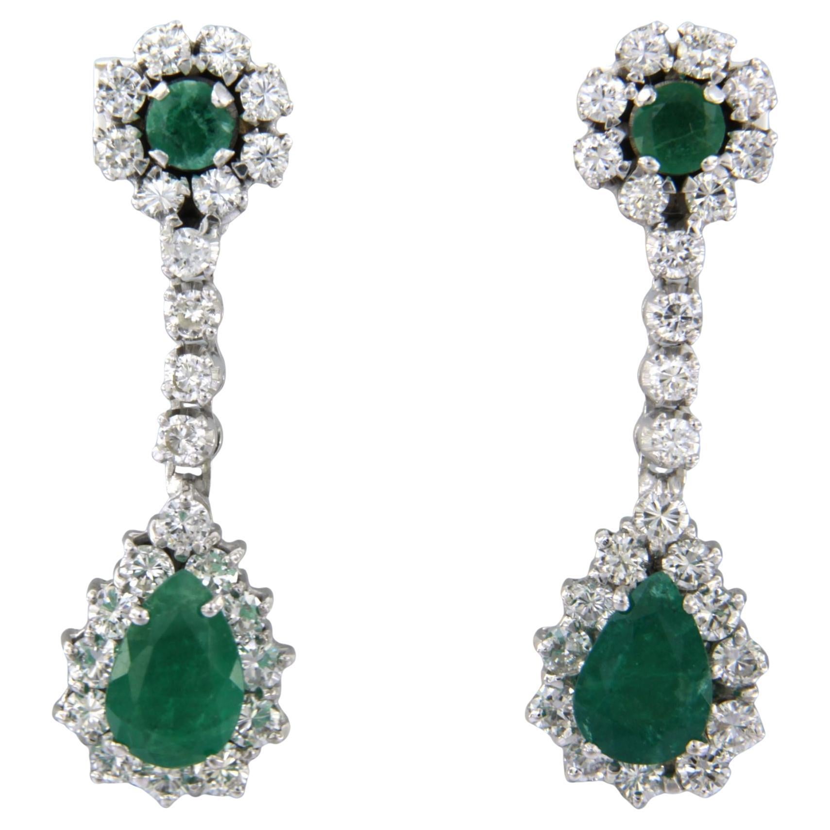 Earrings with emerald 2.00ct and brilliant cut diamonds up to 1.50ct 14k gold For Sale
