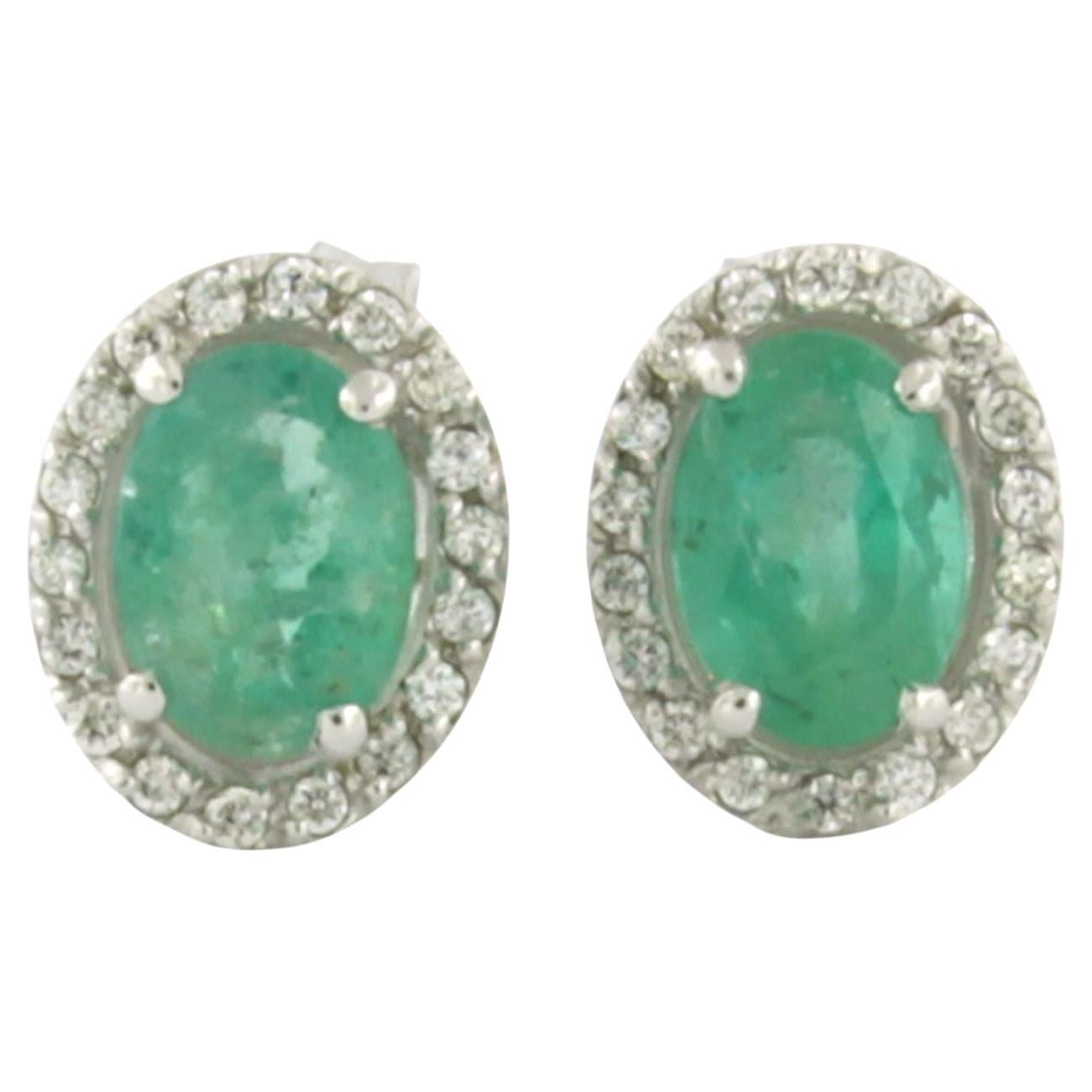 Boucles d'oreilles avec émeraude et diamants taille brillant jusqu'à 0,20ct or 14k 2,5 grammes