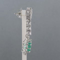 Earrings with emerald and brilliant cut diamonds up to 5.00ct 14k gold