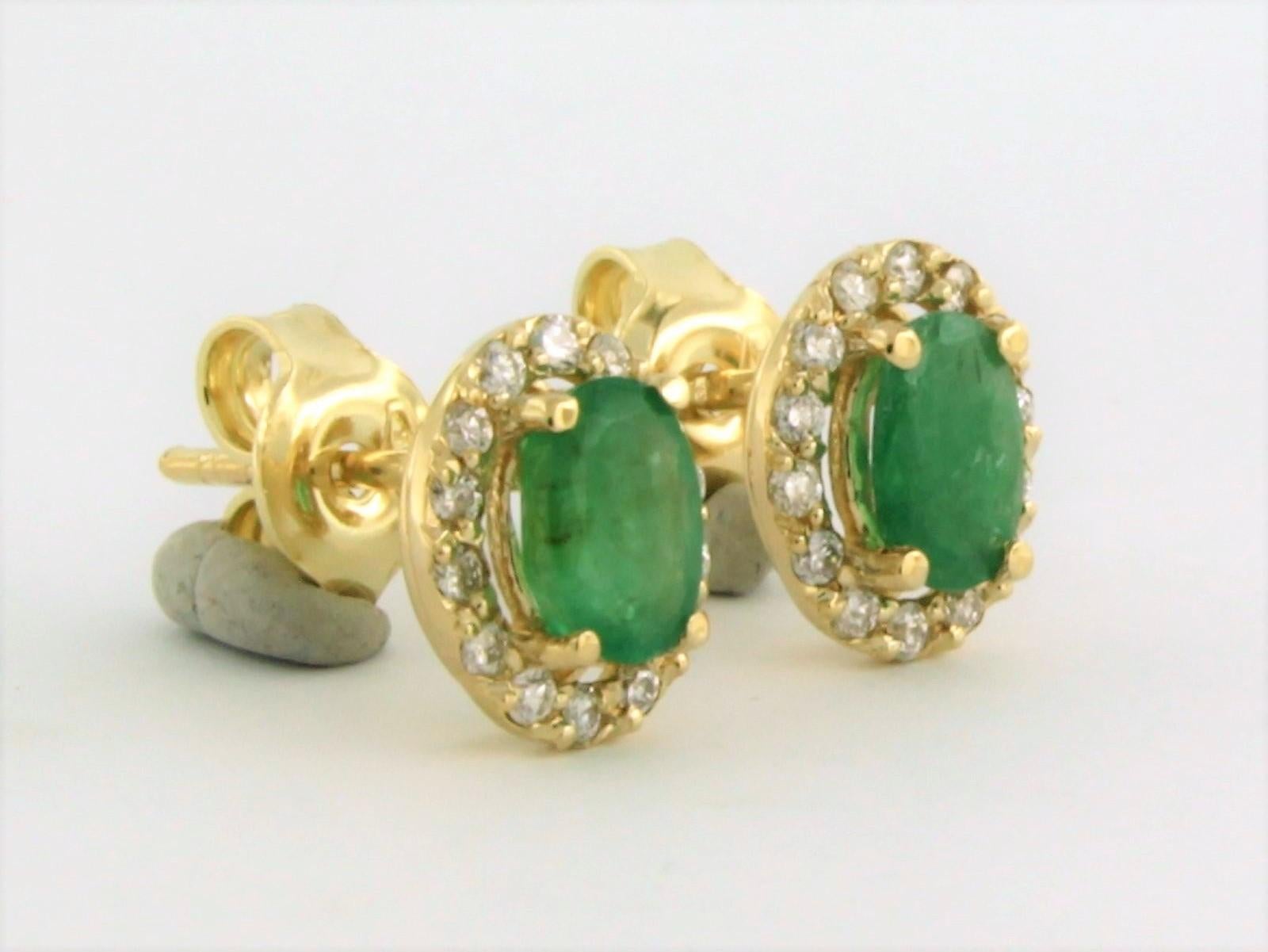 Modern Earrings with emerald up to 0.90ct and brilliant diamonds up to 0.22ct 14k gold For Sale