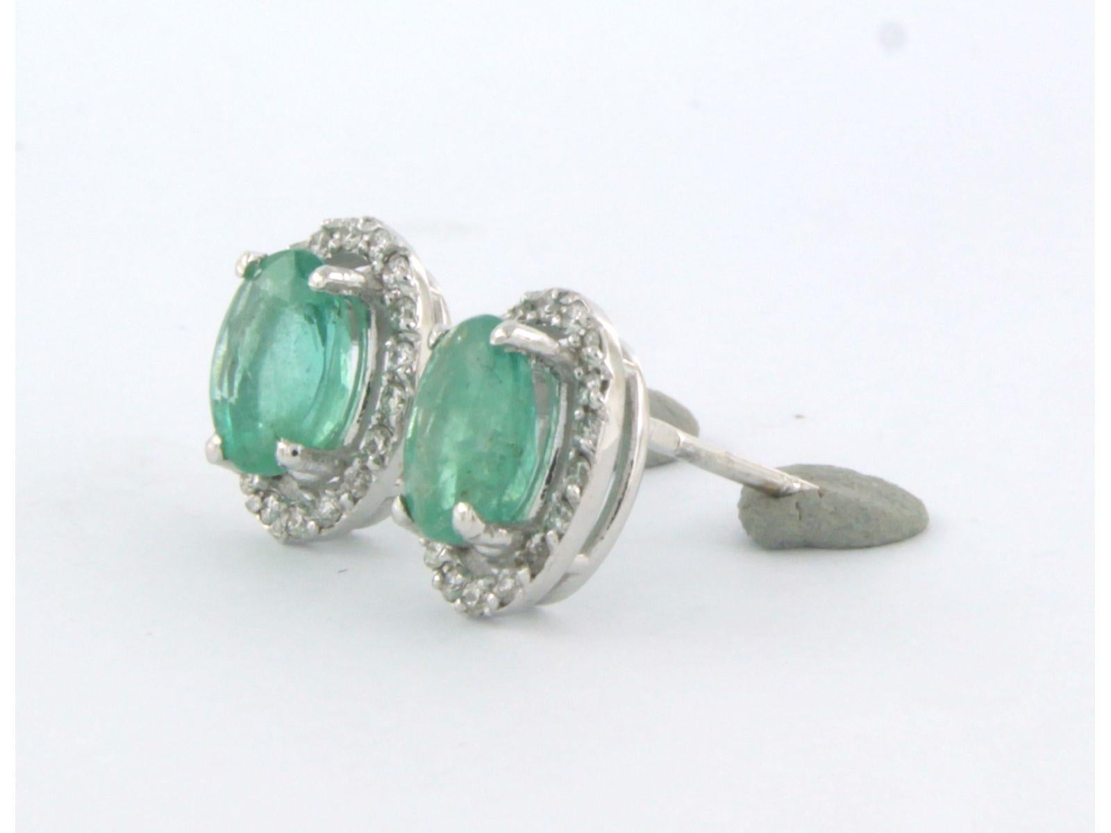 Women's Earrings with emerald up to 1.62and brilliant cut diamonds up to 0.20ct 14k gold For Sale