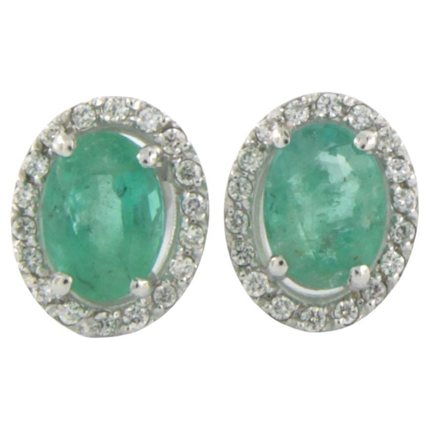 Earrings with emerald up to 1.62and brilliant cut diamonds up to 0.20ct 14k gold