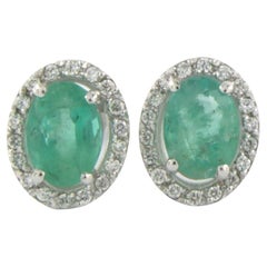 Earrings with emerald up to 1.62and brilliant cut diamonds up to 0.20ct 14k gold